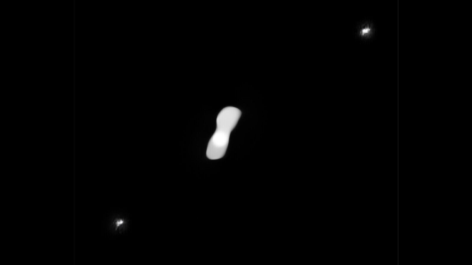 'Dog bone' asteroid spied by astronomers in new photos